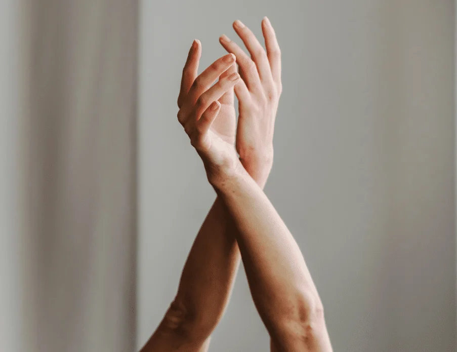 Raised hands of dancers
